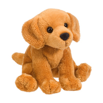 A tan dog plush sitting down.