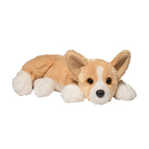 A little dog with big ears laying down.