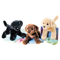 Three lab plushes hanging out together.