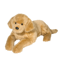 A yellow dog plush laying down.