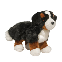 A super fluffy bernese mountain dog plush standing up.