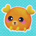A round orange moose plush.